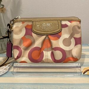 Coach Signature Optic C patent trim wristlet orange, magenta, tan and cream